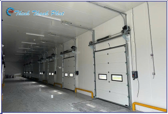 CỬA TRƯỢT TRẦN CÔNG NGHIỆP: HIỆU QUẢ, TIẾT KIỆM